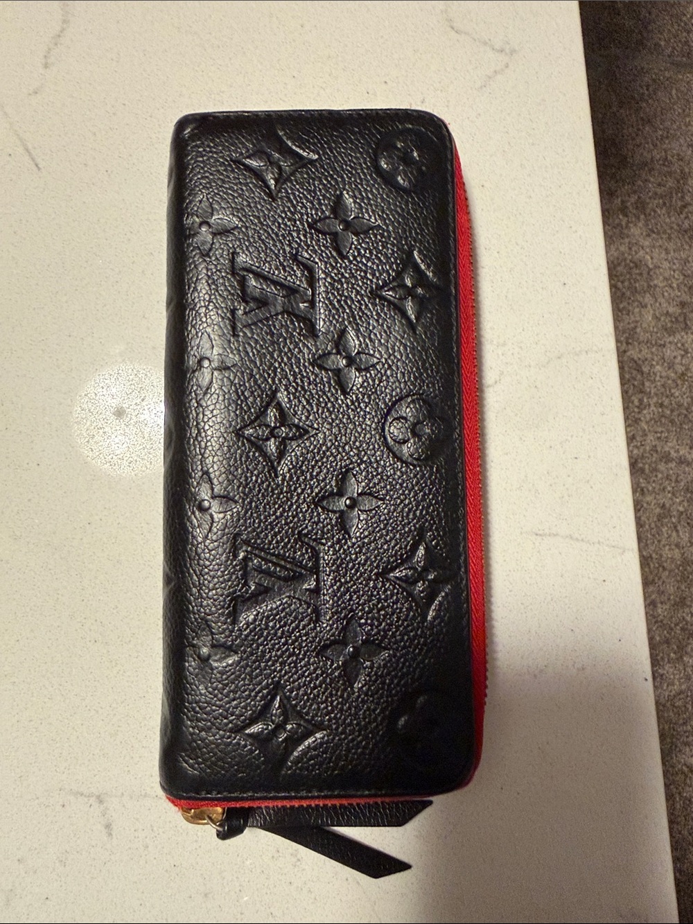Louis Vuitton Monogrammed  Zippy wallet red and black authentic